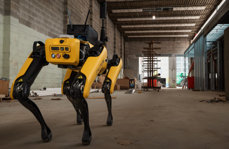 Quadrupedal robot designed to automate 360-degree visual documentation navigating a construction site.