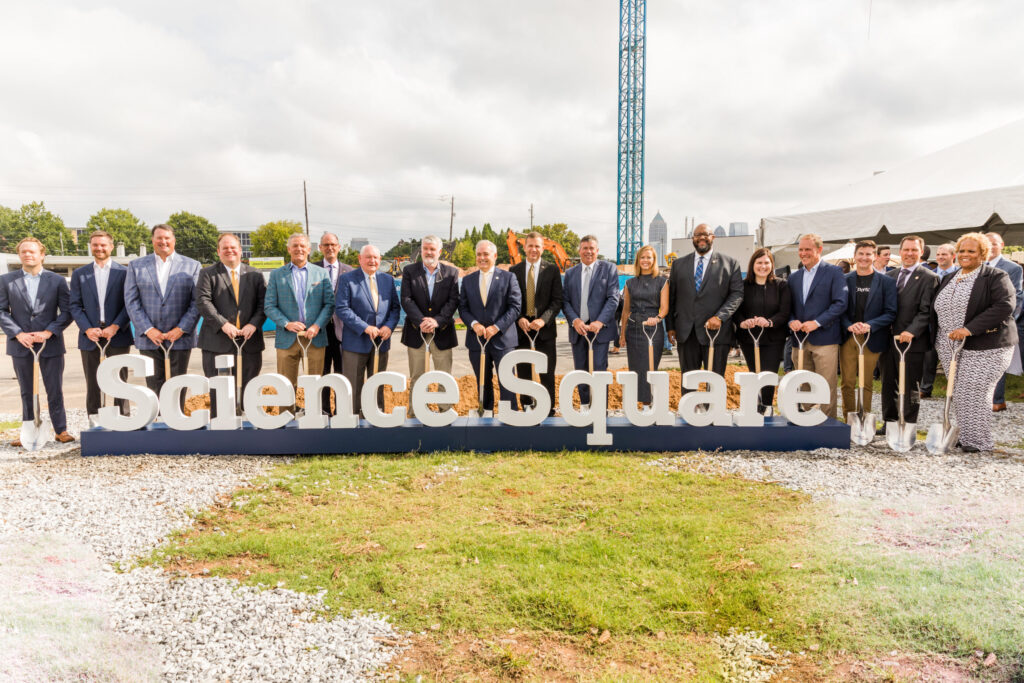 Group of individuals at a groundbreaking ceremony for the Bioscience Science Square.