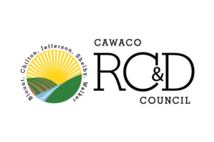 Logo of Cawaco RC&D Council, featuring a stylized sun over rolling hills and a river, with text listing the counties it serves.